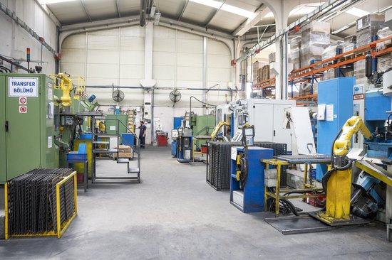 Transfer department with robotic assembly cells